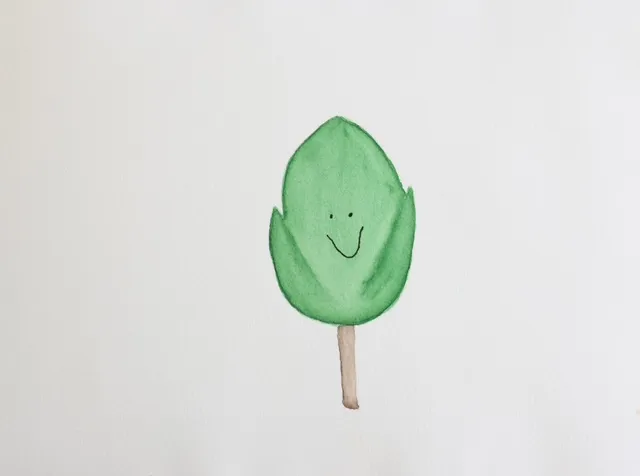 Cora Leaf - A friendly green leaf character with a warm smile